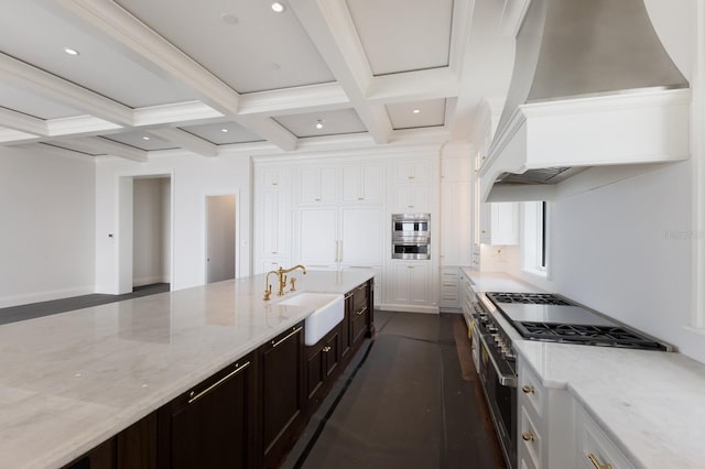 894 Hill Tide Ln, Boca Grande, FL 33921 - kitchen featuring premium range hood, a sink, beam ceiling, white cabinetry, and light stone counters