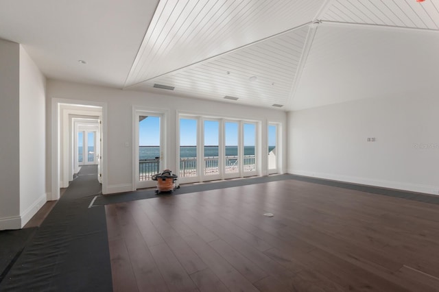 894 Hill Tide Ln, Boca Grande, FL 33921 - unfurnished living room featuring a water view, baseboards, dark wood-style floors, wood ceiling, and lofted ceiling