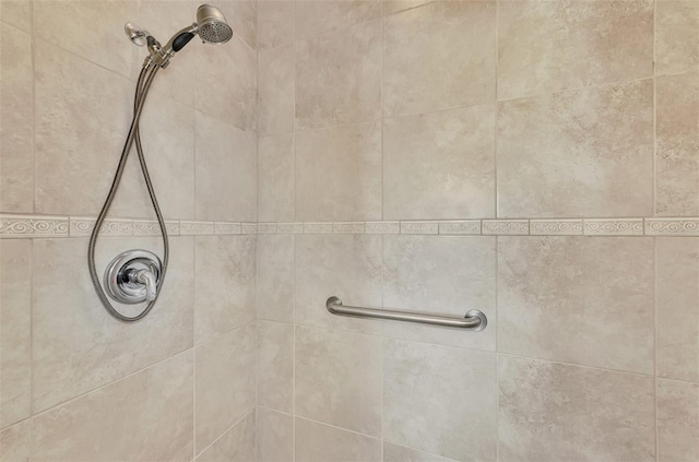 details featuring a tile shower