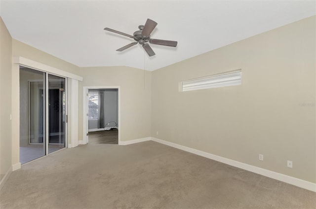 unfurnished bedroom featuring a closet, carpet flooring, a ceiling fan, and baseboards