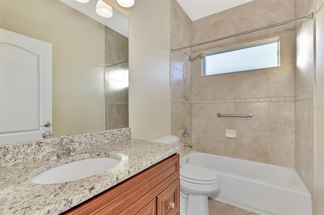 bathroom with tile patterned floors, shower / washtub combination, toilet, and vanity