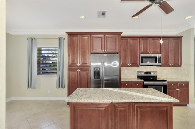 kitchen featuring visible vents, backsplash, appliances with stainless steel finishes, and crown molding