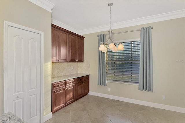 kitchen with backsplash, an inviting chandelier, crown molding, baseboards, and light stone countertops