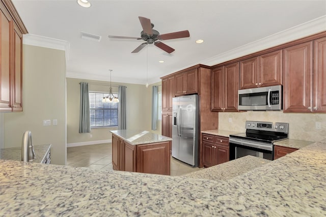 kitchen with visible vents, light tile patterned flooring, stainless steel appliances, crown molding, and tasteful backsplash