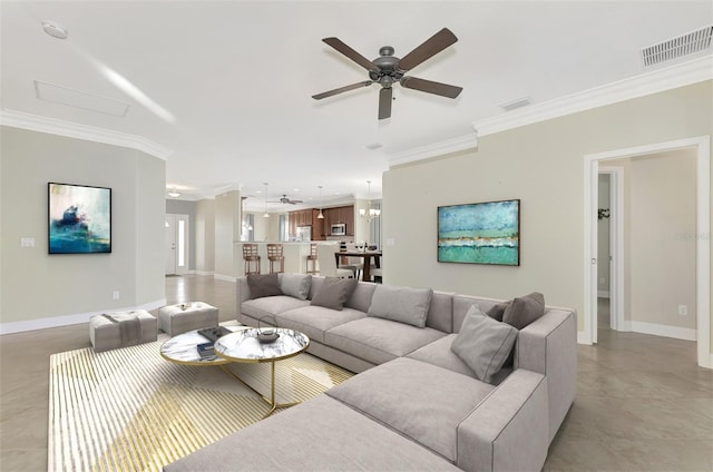 living room featuring visible vents, baseboards, ceiling fan, and crown molding