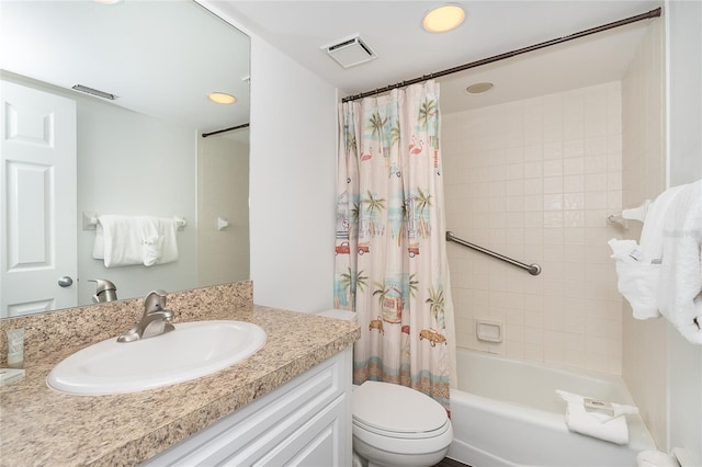 full bathroom with toilet, vanity, and shower / bath combo with shower curtain