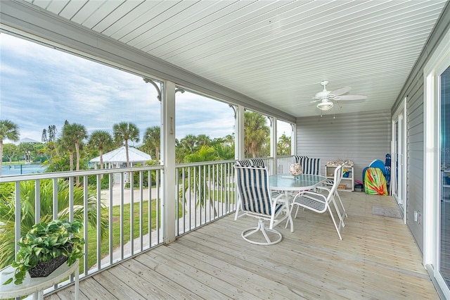 wooden deck with ceiling fan