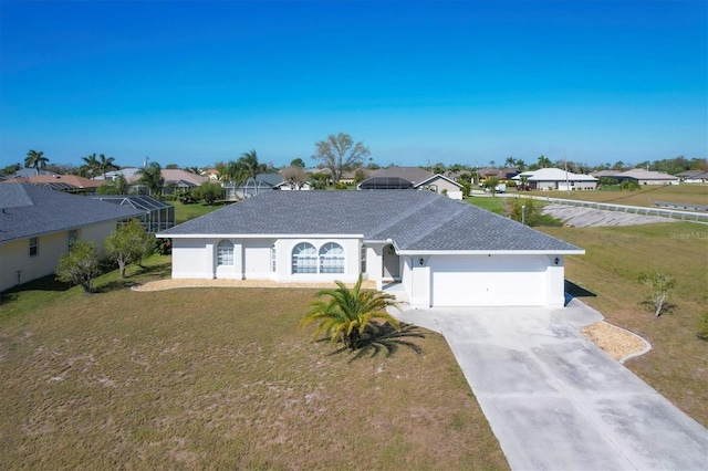 ranch-style house with a front yard and a garage