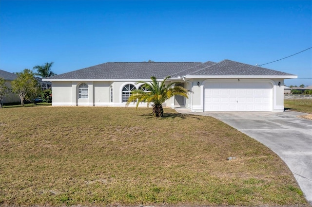 ranch-style home with a front yard and a garage