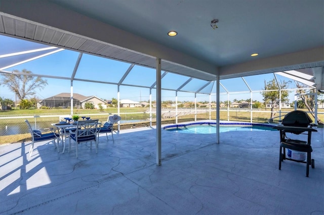 view of pool featuring a lanai and a patio area