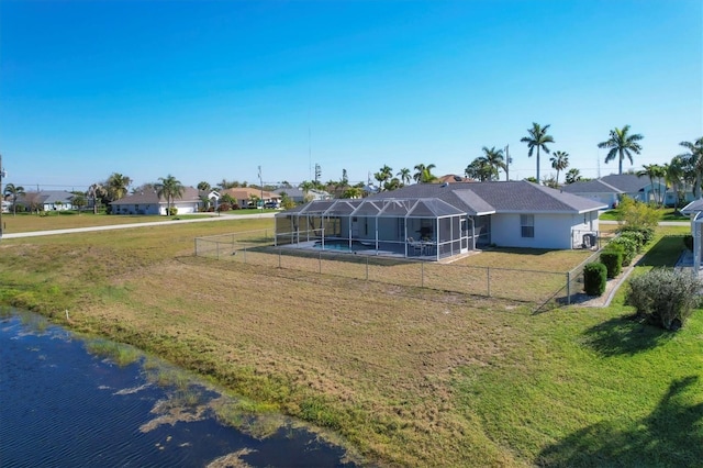 view of front facade featuring a lanai and a front lawn