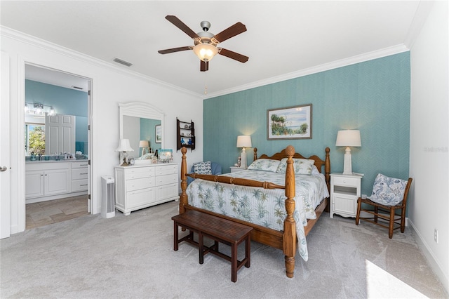 bedroom with light carpet, connected bathroom, crown molding, and ceiling fan