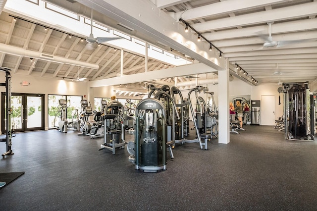 exercise room featuring a high ceiling, french doors, ceiling fan, and track lighting