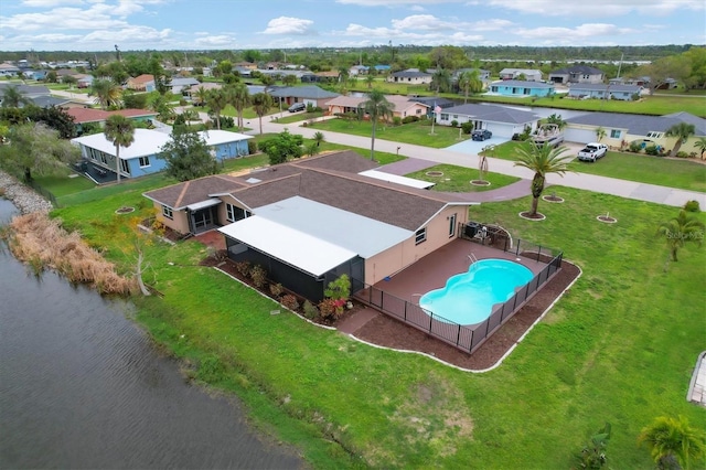 drone / aerial view featuring a water view