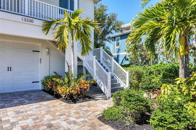 property entrance with a garage