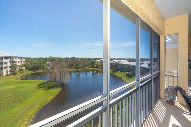 balcony featuring a water view