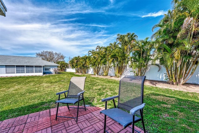 exterior space featuring a patio area and a yard