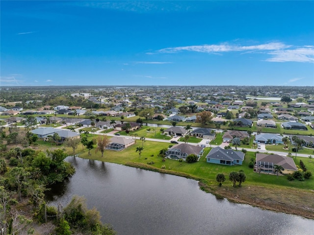 bird's eye view with a water view