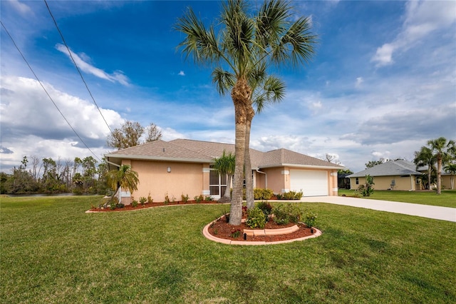 view of front of property featuring a front yard and a garage