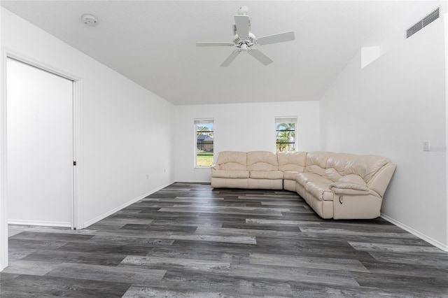 unfurnished living room with ceiling fan, dark hardwood / wood-style flooring, and lofted ceiling