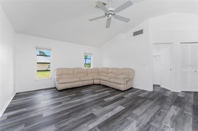 unfurnished living room with dark wood-type flooring, ceiling fan, and lofted ceiling