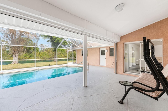 view of pool featuring a lanai and a patio area