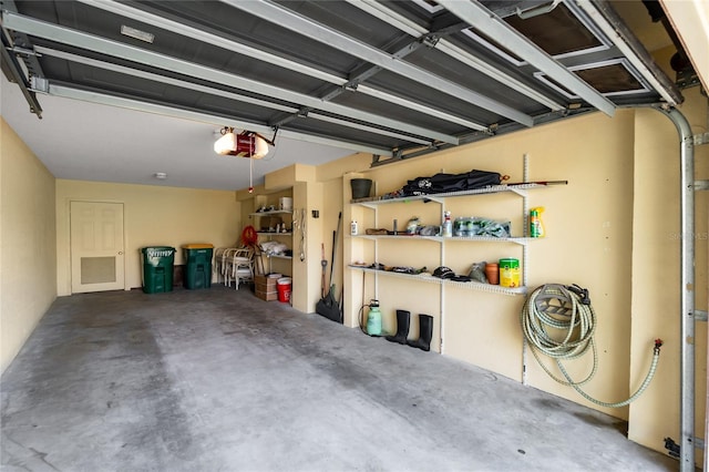 garage featuring a garage door opener