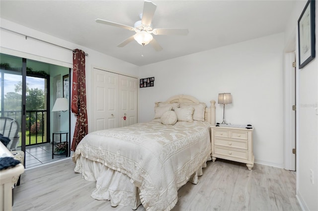 bedroom with ceiling fan, access to exterior, light wood-type flooring, and a closet