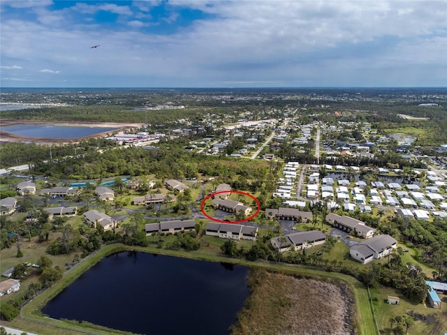 drone / aerial view featuring a water view