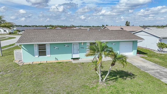 single story home with a front lawn and a garage