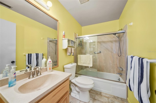 full bathroom with combined bath / shower with glass door, toilet, vanity, and tile flooring