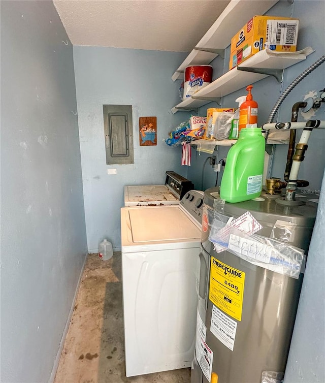 clothes washing area featuring electric panel, washer and clothes dryer, and water heater