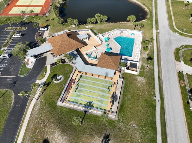 drone / aerial view with a water view