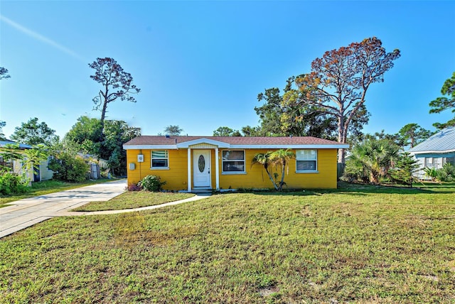 ranch-style house with a front yard