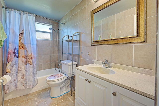 full bathroom featuring shower / tub combo, tile walls, tile patterned floors, toilet, and vanity