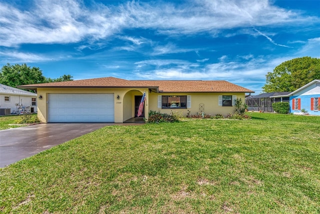 single story home featuring a garage, central air condition unit, glass enclosure, and a front yard