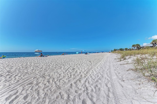 property view of water with a beach view