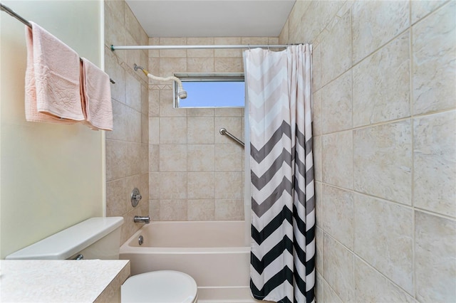 bathroom with toilet and shower / tub combo