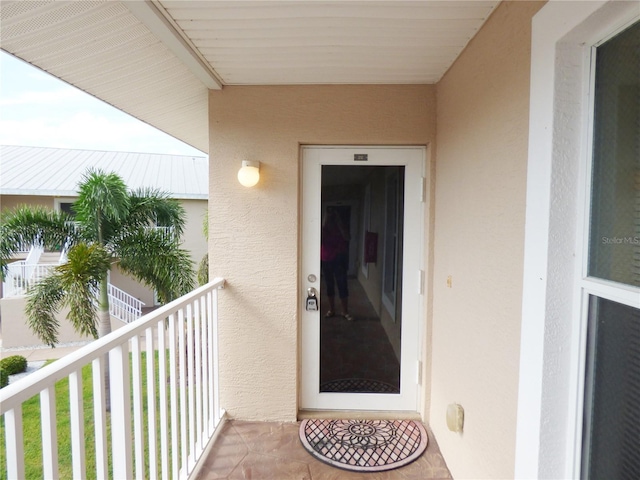 doorway to property with a balcony