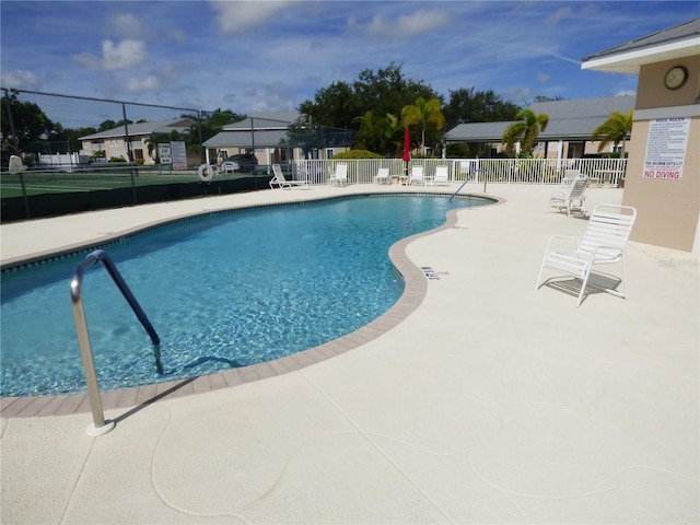 view of swimming pool featuring a patio