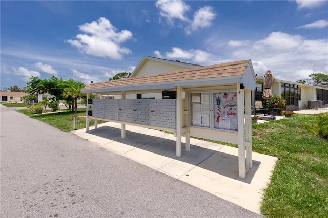 view of property's community with mail boxes