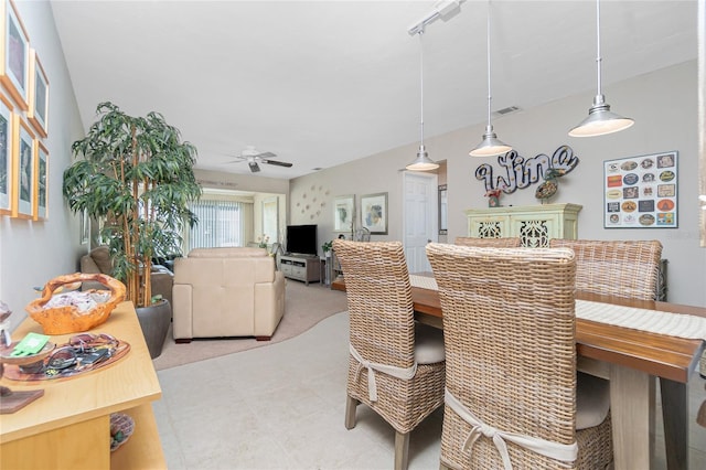 dining space featuring ceiling fan