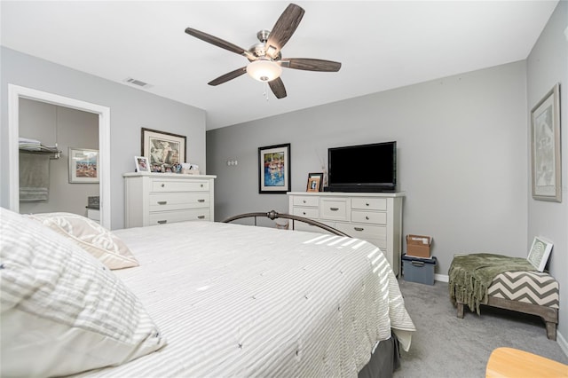 bedroom with light colored carpet and ceiling fan