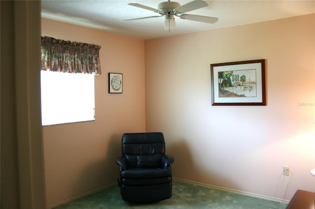 unfurnished room featuring carpet floors and ceiling fan