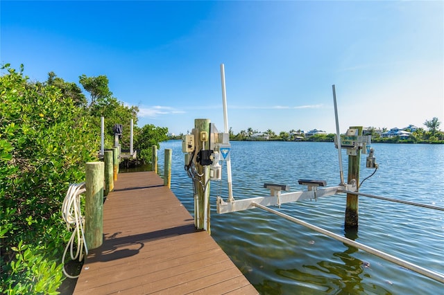 view of dock with a water view