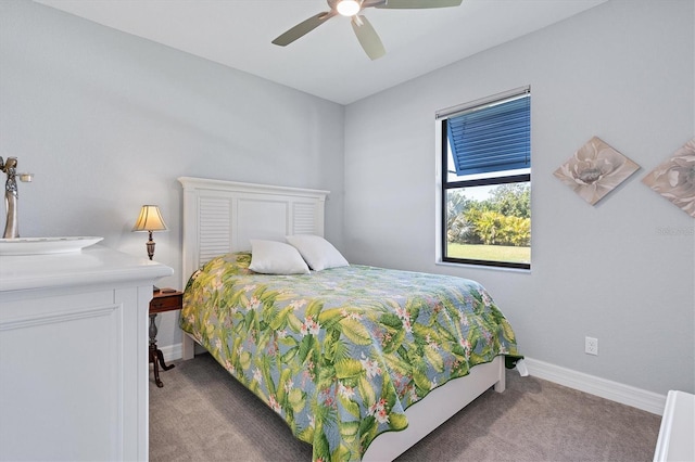 carpeted bedroom with ceiling fan