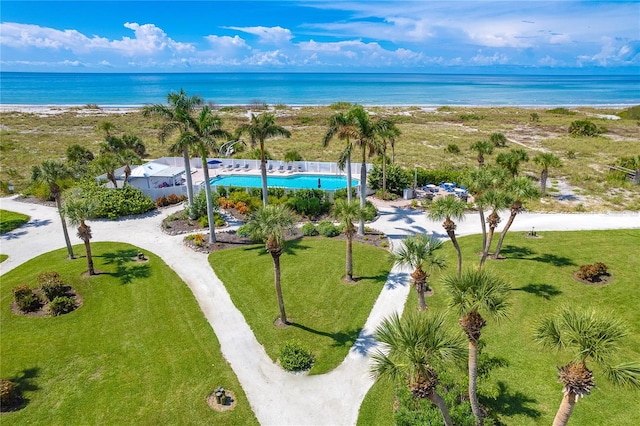 birds eye view of property with a water view