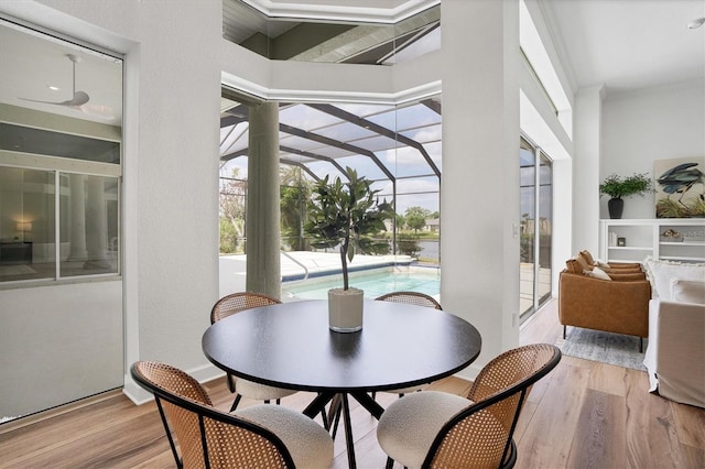 dining space with light wood-type flooring