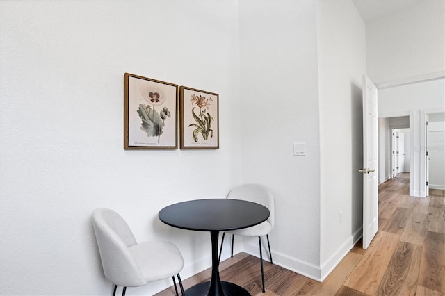 sitting room featuring light hardwood / wood-style floors