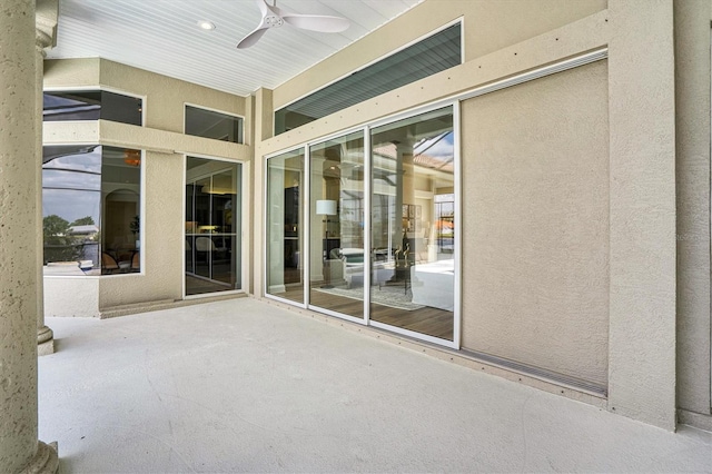 exterior space featuring ceiling fan